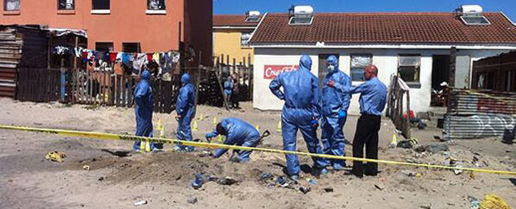 FILE: Police forensics dig behind the Mitchells Plain homes of Shaskia Michaels and Kauthar Bobbs on 18 October 2013. Picture: Siyabonga Sesant/EWN