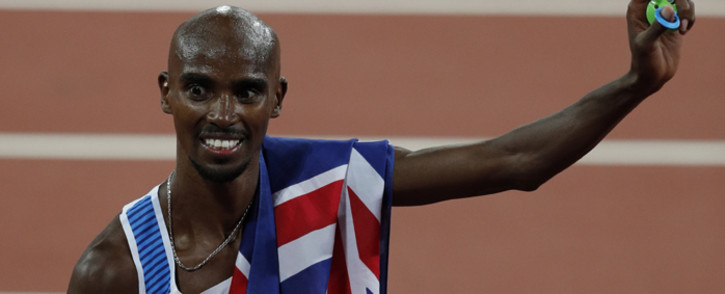 Britain's Mo Farah celebrates after winning the final of the men's 10,000m athletics event at the 2017 IAAF World Championships at the London Stadium in London on 4 August, 2017. Picture: AFP