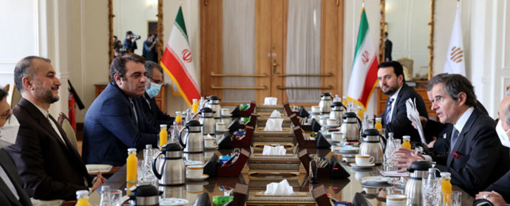 Iranian Foreign Minister Hossein Amir-Abdollahian (L) meets with the head of the International Atomic Energy Agency (IAEA) Rafael Grossi (R) in the capital Tehran on 5 March 2022. Picture: ATTA KENARE/AFP