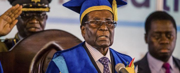 Zimbabwe's President Robert Mugabe delivers a speech during a graduation ceremony at the Zimbabwe Open University in Harare, where he presides as the chancellor on 17 November 2017. This is his first public appearance since a military takeover on 14 November 2017. Picture: AFP.