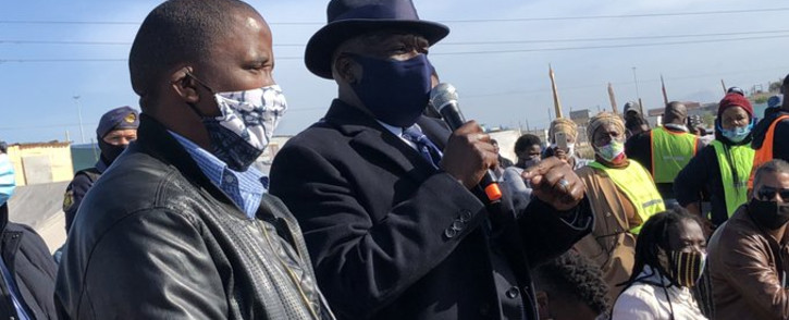 Police Minister Bheki Cele in Khayelitsha on Saturday 4 July 2020 where he met with Bulelani Qholani, who was dragged out of his home without clothes during an eviction by CoCT officials. Picture: Lirandzu Temba/Twitter