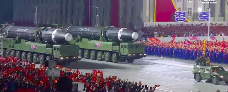 A screen grab taken from a KCNA broadcast on 10 October 2020 shows what appears to be new North Korean intercontinental ballistic missiles during a military parade marking the 75th anniversary of the founding of the Workers' Party of Korea, on Kim Il Sung square in Pyongyang. Picture: AFP. 