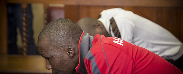 Convicted murderer Sifundo Mzimela looks up in the dock ahead of sentencing in the murder case of Mozambican national Emmanuel Sithole in the Johannesburg magistrate's court. Picture:Reinart Toerien/EWN