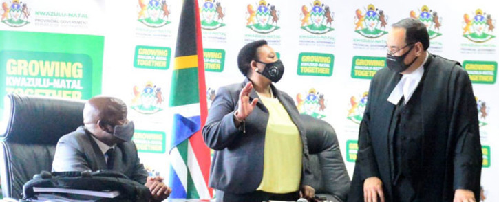 KwaZulu-Natal Premier Sihle Zikalala (left) watches as Nomusa Dube-Ncube (centre) is sworn in as Finance MEC on 17 November 2020. Picture: @kzngov/Twitter