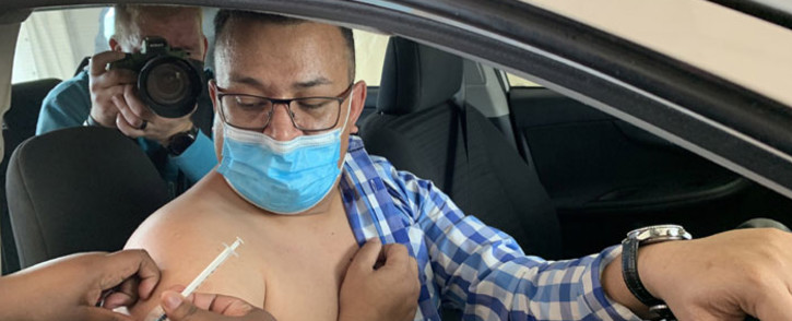 Jody Ziervogel gets his COVID-19 vaccine shot at the ATlone Stadium drive-through facility in Cape Town on 2 September 2021. Picture: Kaylynn Palm/Eyewitness News