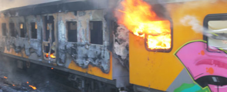 FILE: A Metrorail train burns in Woodstock on 22 January 2013. Picture: Supplied