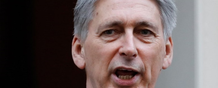 FILE: Philip Hammond leaves 11 Downing Street in London on 31 October 2018. Picture: AFP 