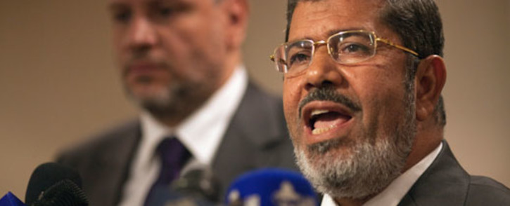 FILE: Muslim Brotherhood Egyptian presidential candidate Mohammed Mursi gives a press conference in Cairo on May 26, 2012. Picture: AFP