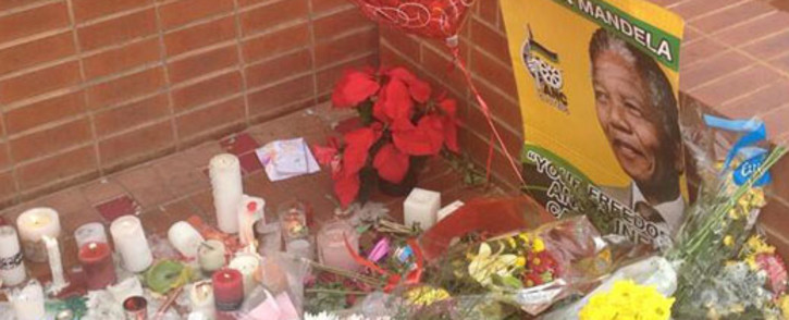 Flowers, balloons and candles left at the Mandela House in Soweto. Picture: Govan Whittles/EWN