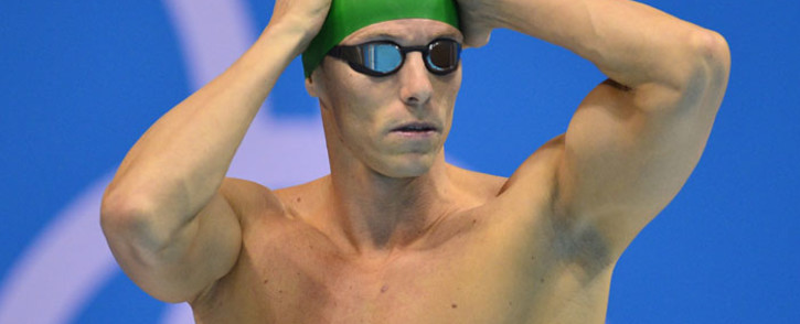FILE: South Africa's Roland Schoeman prepares to compete in the men's 50m freestyle semifinals swimming event at the London 2012 Olympic Games on 2 August 2012 in London. Picture: Fabrice Coffrini/AFP