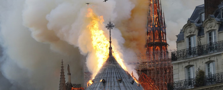 Smoke and flames rise during a fire at the landmark Notre-Dame Cathedral in central Paris on 15 April 2019. Picture: AFP