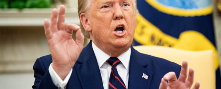 FILE: US President Donald Trump speaks to the press as he meets with Finland's President Sauli Niinisto (not shown) in the Oval Office of the White House on 2 October 2019 in Washington, DC. Picture: AFP