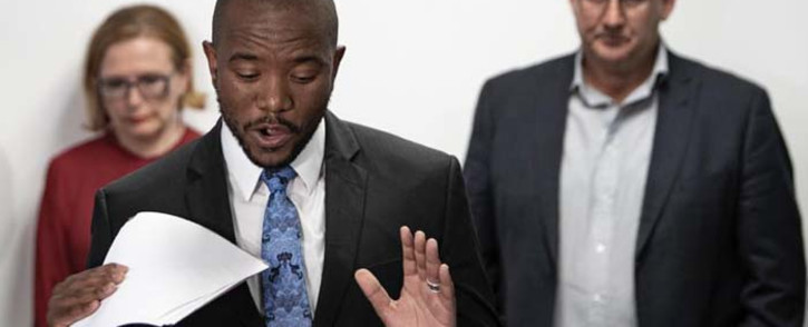 Mmusi Maimane announces his resignation as DA leader, with Helen Zille and Athol Trollip in the background, on 23 October 2019. Picture: Sethembiso Zulu/EWN