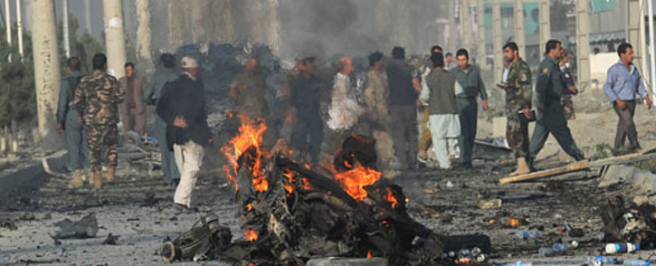 A suicide bomber blew herself up alongside a minivan carrying foreigners on a major highway leading to the international airport in the Afghan capital, police said, killing at least 10 people, including nine foreigners. Picture: AFP.