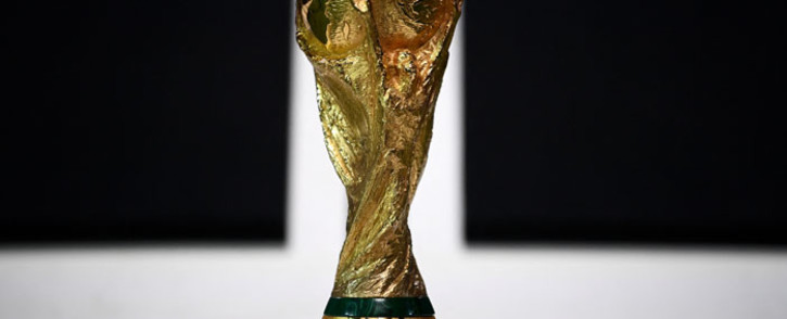 A picture taken on 31 March 2022 shows the World Cup Trophy during the Fifa Congress in the Qatari capital of Doha. Picture: FRANCK FIFE/AFP