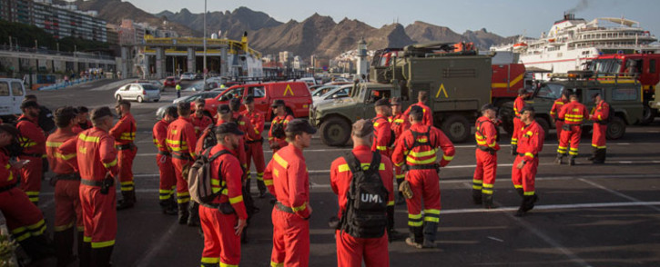 Members of the Spanish Army Emergency Military Unit prepare to travel by boat from Tenerife to the island of Gran Canaria to participate in the extinction of a new forest fire in the town of Valleseco on 17 August 2019. Picture: AFP