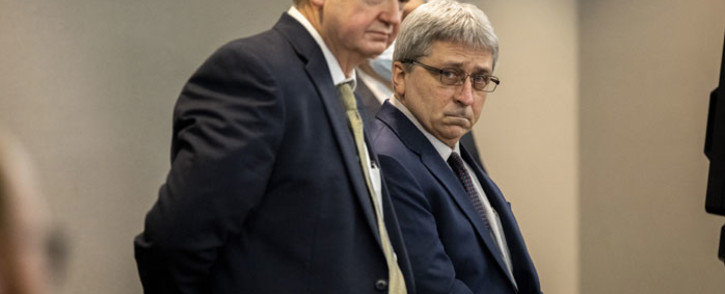 William 'Roddie' Bryan stands next to his attorney Kevin Gough after the jury handed down their verdict in the trial of Greg McMichel and his son, Travis McMichael, and a neighbor, William 'Roddie' Bryan in the Glynn County Courthouse on 24 November 2021 in Brunswick, Georgia. Picture: Stephen B. Morton-Pool/Getty Images via AFP