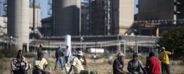 FILE: Striking platinum miners gather at the Wonderkop Stadium in Marikana. Picture: AFP.