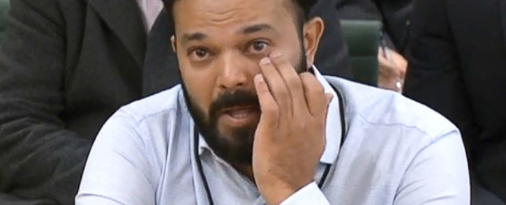 A video grab from footage broadcast by the UK Parliament's Parliamentary Recording Unit (PRU) shows former Yorkshire cricketer Azeem Rafiq fighting back tears while testifying in front of a Digital, Culture, Media and Sport (DCMS) Committee in London on 16 November 2021 as MPs probe racial harassment at the club. Picture: Handout/PRU/AFP