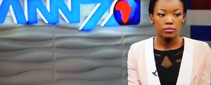 A screenshot of an ANN7 news anchor during a live bulletin riddled with errors