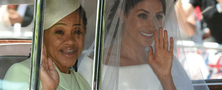 FILE: Meghan Markle (R) and her mother, Doria Ragland, arrive for her wedding ceremony to marry Britain's Prince Harry, Duke of Sussex, at St George's Chapel, Windsor Castle, in Windsor, on 19 May 2018. Picture: AFP.