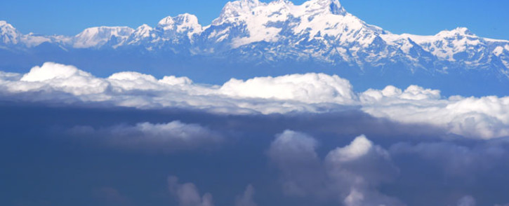 Nepalese mountains in the Himalaya range rise above the clouds. Picture: AFP