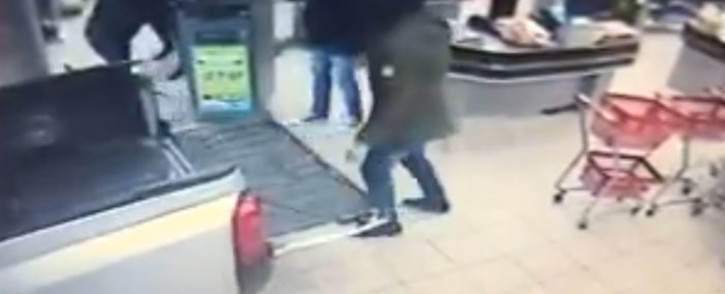 A screengrab of armed robbers who made off with an entire ATM machine.