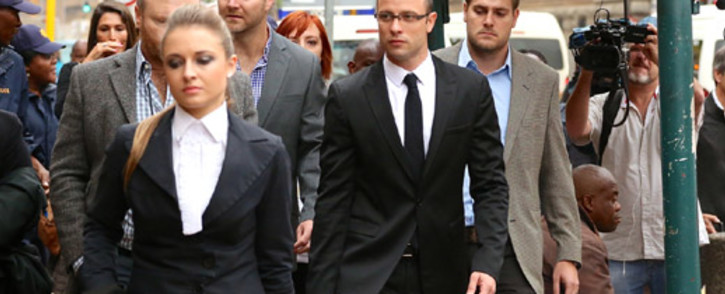 Oscar Pistorius arrives at the High in Pretoria ahead of day 10 of his murder trial on 14 March 2014. Picture: Aletta Gardner/EWN.