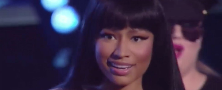 Nicki Minaj confronts Miley Cyrus on stage at the MVAs after accepting her award. Picture:CNN/screengrab