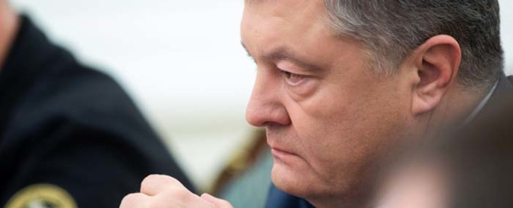 FILE: This handout picture taken and released by the Ukrainian Presidential press service shows President of Ukraine Petro Poroshenko leading a session of the National Security and Defense Council of Ukraine in Kiev early on 26 November 2018, following an incident in the Black Sea off Moscow-annexed Crimea. Picture: AFP