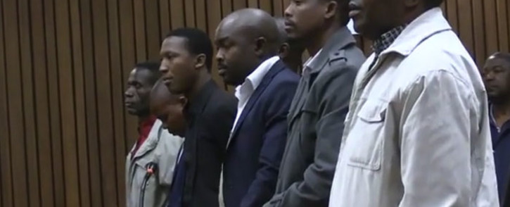 Screengrab of eight former police officers convicted of the murder for Mozambican taxi driver Mido Macia.