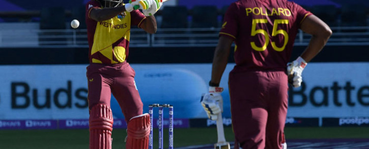 Chris Gayle (left) and Kieron Pollard in action for the West Indies at the 2020 T20 World Cup. Picture: @T20WorldCup/Twitter
