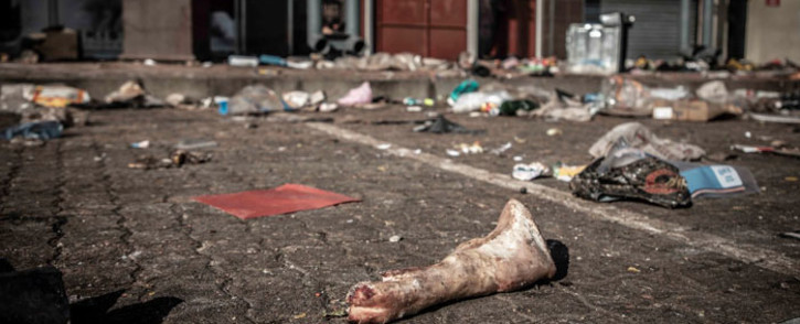 A pork trotter lies among other debris after looting at a Gauteng shopping centre. Picture: Abigail Javier/Eyewitness News