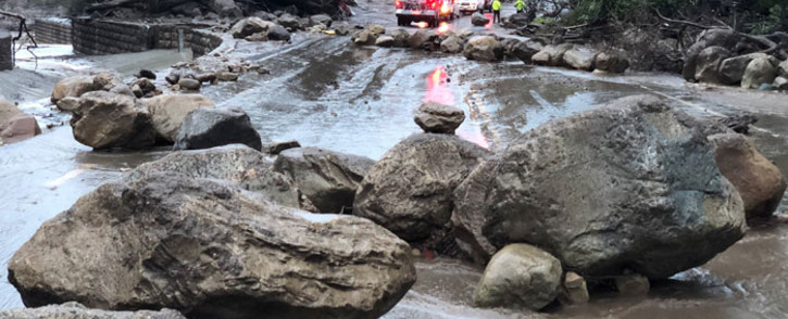 Rocks block the Hot Springs Road in Montecito following debris and mud flow due to heavy rain falls in Montecito, California, on 9 January, 2018. Picture: AFP