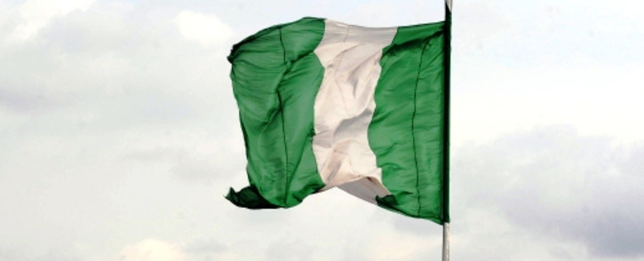 FILE: The Nigerian flag flies in Lagos. Picture: AFP.