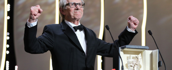 British director Ken Loach celebrates on stage after being awarded with the Palme d’Or for the film “I, Daniel Blake” during the closing ceremony of the 69th Cannes Film Festival in Cannes, southern France, on 22 May, 2016. Picture: AFP.