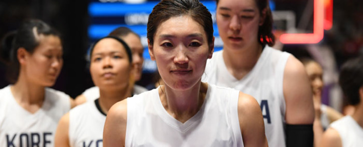 Unified Korea's Lim Yung-hui (C) leaves the court after defeat during the women's gold medal basketball match between Unified Korea and China at the 2018 Asian Games in Jakarta on 1 September, 2018. Picture: AFP