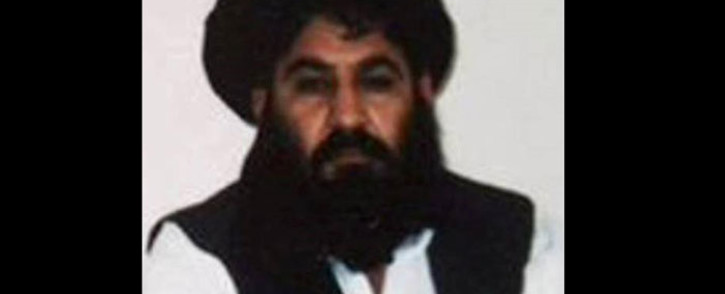 This handout file photo released by the Afghan Taliban on 3 December 2015, which was taken on a mobile phone in mid-2014 is said to show Afghan Taliban leader Mullah Akhtar Mansour posing for a photograph at an undisclosed location in Afghanistan. Picture: Handout/Afghan Taliban/AFP