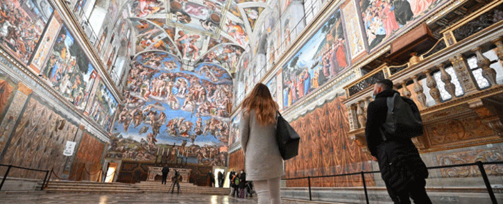 People visit the Sistine Chapel on the reopening day of the Vatican museum on February 1, 2021 in Vatican City, as the city-state eases its closure aimed at curbing the spread of the COVID-19 infection, caused by the new coronavirus. Picture: Andreas Solaro / AFP.