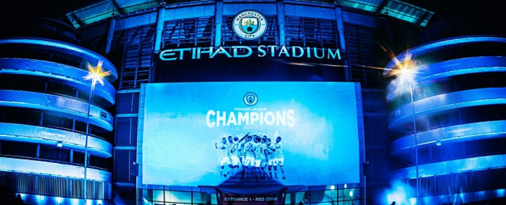 City joined the celebrations by unveiling a giant sky blue banner on the outside of the stadium once the final whistle blew in the United game. Picture: @ManCity/Twitter