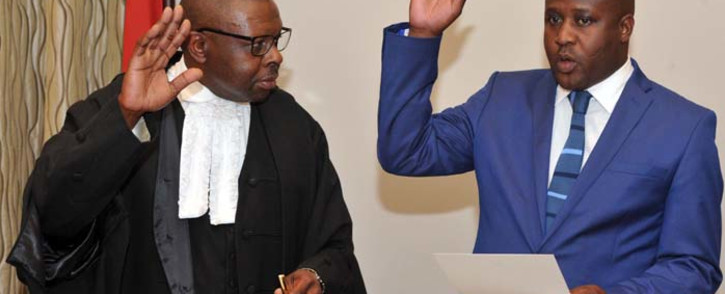 FILE: Western Cape Judge President John Hlope (left) swearing-in Bongani Bongo as a minister. Picture: GCIS
