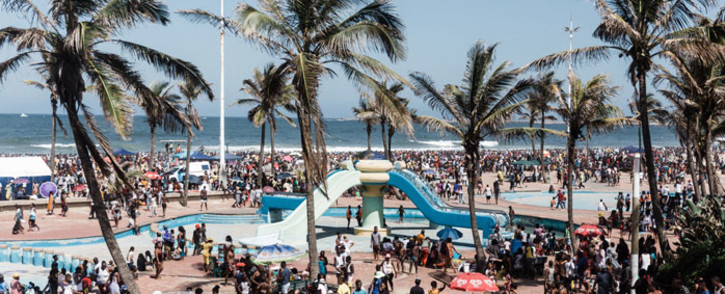 A general view taken on 1 January 2022 shows thousands of New Year's Day revellers and holidaymakers gathering on the South Beach during New Year festivities in Durban after the government lifted a COVID-19 restriction by removing the midnight to 4am curfew. Picture: Rajesh JANTILAL/AFP