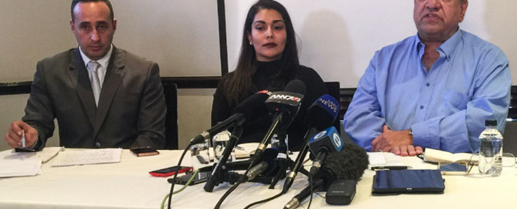 Renisha Jimmy (centre), sister of the late Reshall Jimmy, family attorney (left) and forensic pathologist David Klatzow (right) brief the media on a settlement offer from Ford in Pretoria on 24 May 2017. Picture: Reinart Toerien/EWN.