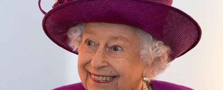 Britain's Queen Elizabeth II gestures as she views exhibits at the new Argyll and Sutherland Highlanders Museum at Stirling Castle, Stirling in Scotland on 29 June 2021, as part of her traditional trip to Scotland for Holyrood Week. Picture: Andrew Milligan/POOL/AFP