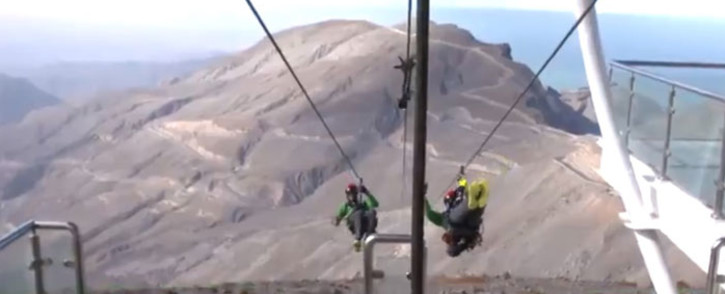 A screengrab of thrill seekers doing the world's longest zipline in the Jebel Jais in Ras Al Khaimah in the United Arab Emirates. Picture: @lovindubai/Twitter