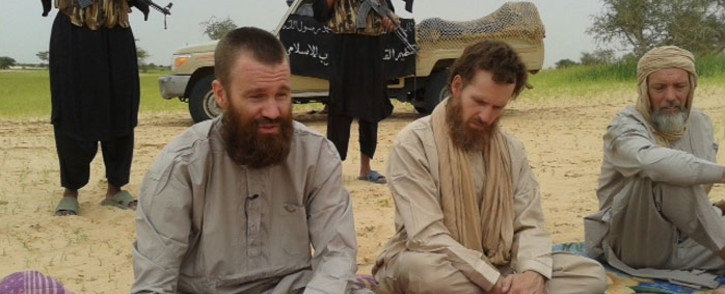 FILE: Swede Johan Gustafsson (L), South African Stephen McGowan (C) and Dutch national Sjaak Rijke (R) held captive by al-Qaeda. Picture: AFP