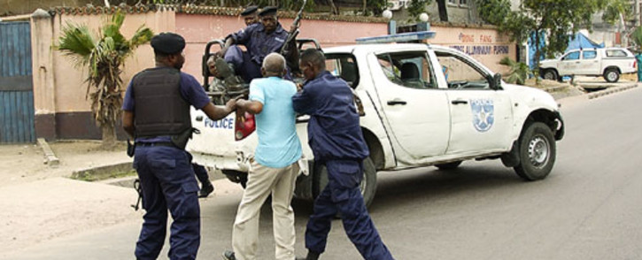 DRC police arrest a suspected rebel. Picture: AFP