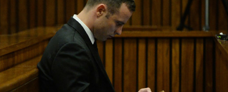 Oscar Pistorius on day 10 of his murder trial at the High Court in Pretoria on 14 March 2014. Picture: Pool.