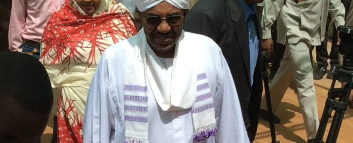 President Omar al-Bashir arrives to cast his vote in the Sudanese elections on 13 April 2015. Picture: Jean-Jacques Cornish.