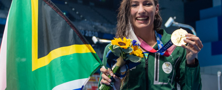 South Africa's Tatjana Schoenmaker with her goldmedal  after winning the final of the women's 200m breaststroke swimming event during the Tokyo 2020 Olympic Games on July 30, 2021.